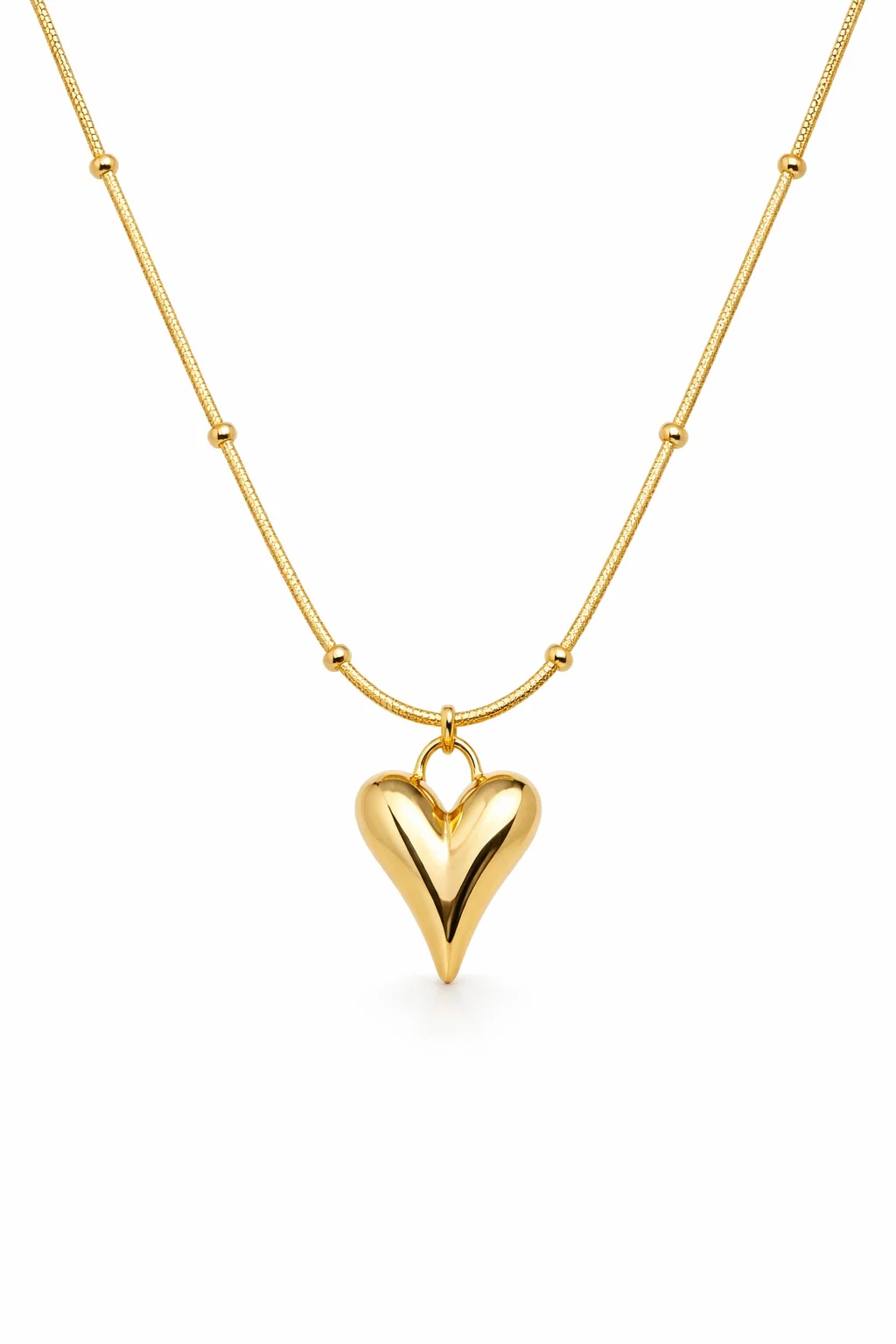 Gold Alphalurent titanium steel necklace featuring a smooth, 3D geometric heart pendant on a beaded snake chain.