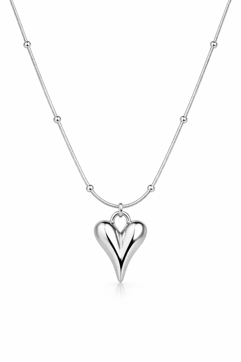 Gold Alphalurent titanium steel necklace featuring a smooth, 3D geometric heart pendant on a beaded snake chain.