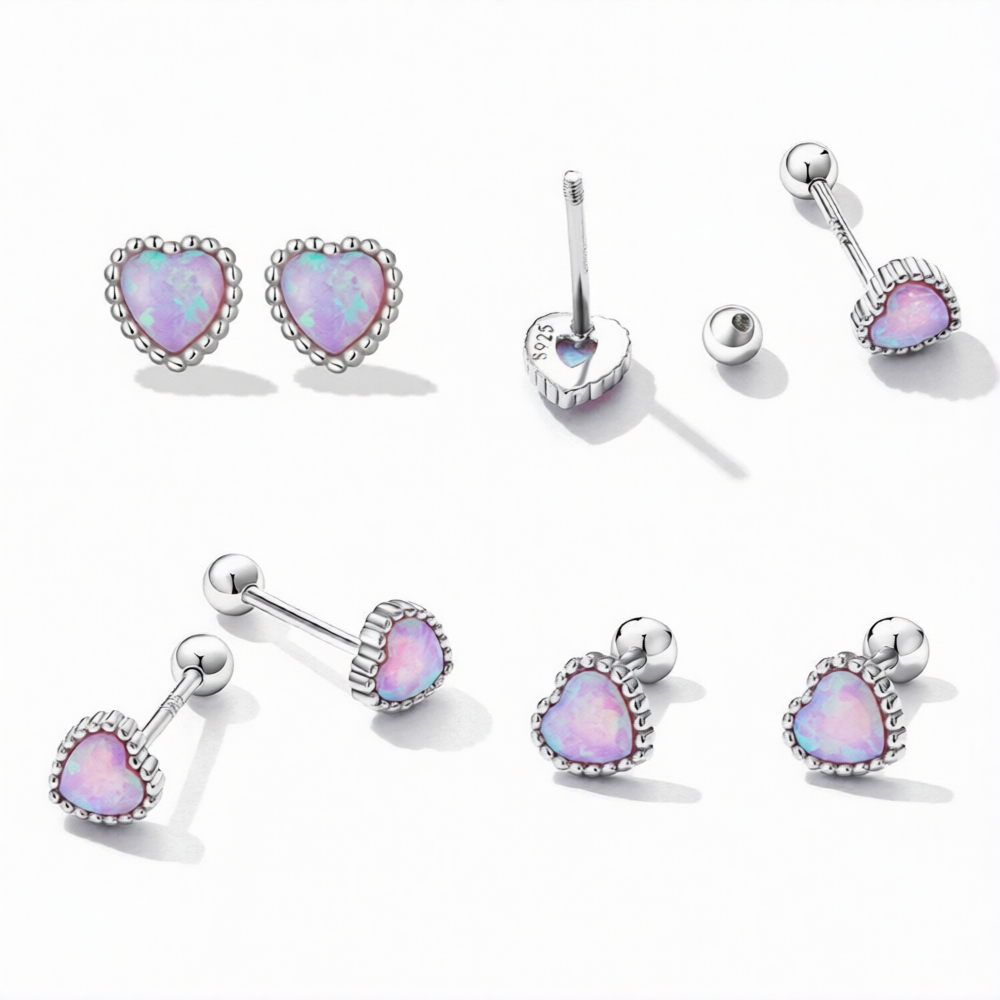 Alphalurent 925 sterling silver stud earrings featuring a heart-shaped iridescent blue opal crystal, a beaded silver edge, and comfortable screw-on ball backs.