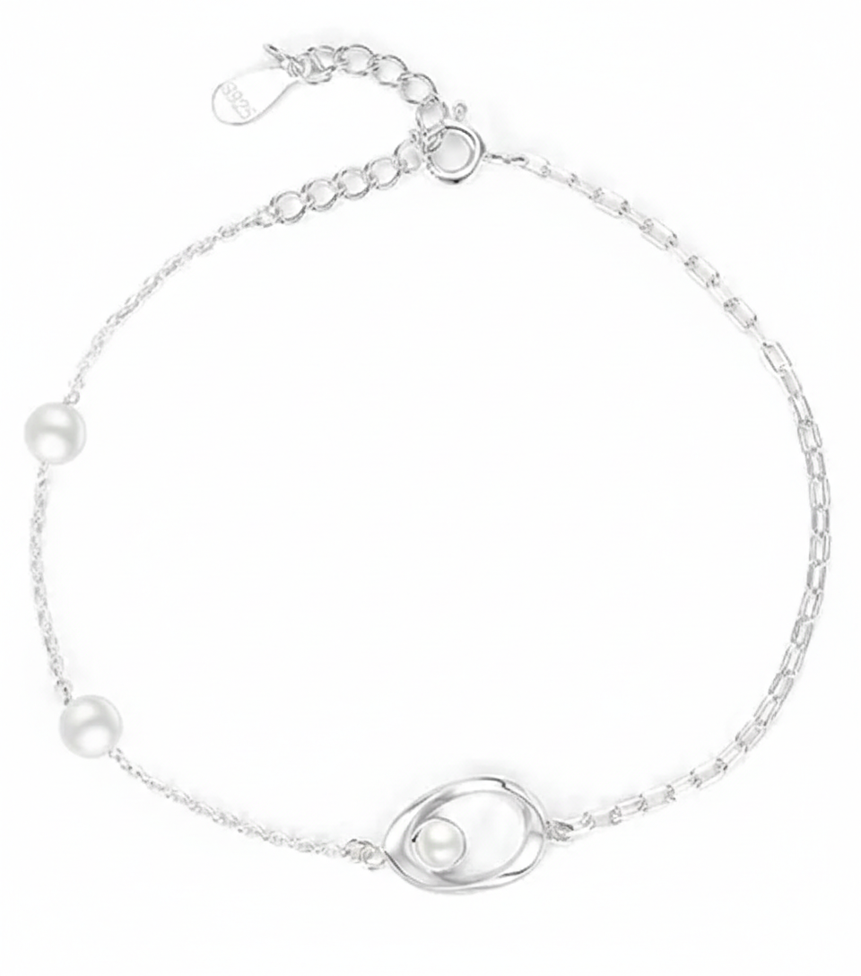 Alphalurent 925 silver necklace featuring a geometric Möbius twist pendant holding a single white pearl. (For the gold bracelet image): Gold-plated Alphalurent bracelet with a twisted pearl charm and two accent pearls on a delicate chain.