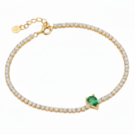 Alphalurent gold tennis bracelet featuring a single heart-shaped red zircon stone. (For the green image): Alphalurent gold vermeil tennis bracelet with a teardrop pear-shaped emerald green zircon.