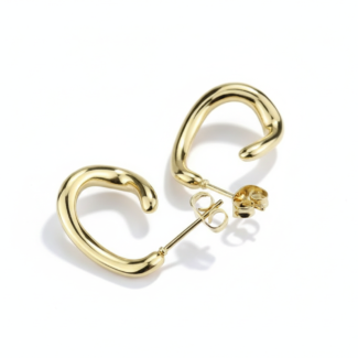 Alphalurent gold titanium steel hoop earrings featuring an irregular, fluid U-shape geometric design. (For the silver image): Model wearing Alphalurent asymmetric silver U-shaped hoop earrings with a sleek, modern finish.