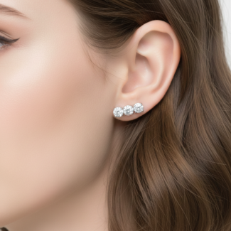 Alphalurent 925 sterling silver minimalist stud earrings featuring a geometric row of three crystals with a textured beaded edge, shown in gold and silver finishes. (For the model images): Model wearing delicate Alphalurent gold tri-gem geometric stud earrings.