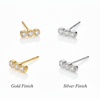 Alphalurent 925 sterling silver minimalist stud earrings featuring a geometric row of three crystals with a textured beaded edge, shown in gold and silver finishes. (For the model images): Model wearing delicate Alphalurent gold tri-gem geometric stud earrings.