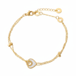 Alphalurent gold titanium steel bracelet featuring a double-strand chain with small tube beads and a white shell heart charm.