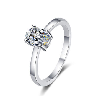Alphalurent solid silver solitaire ring featuring a brilliant oval-cut center stone secured by a classic four-prong setting on a sleek, plain band.